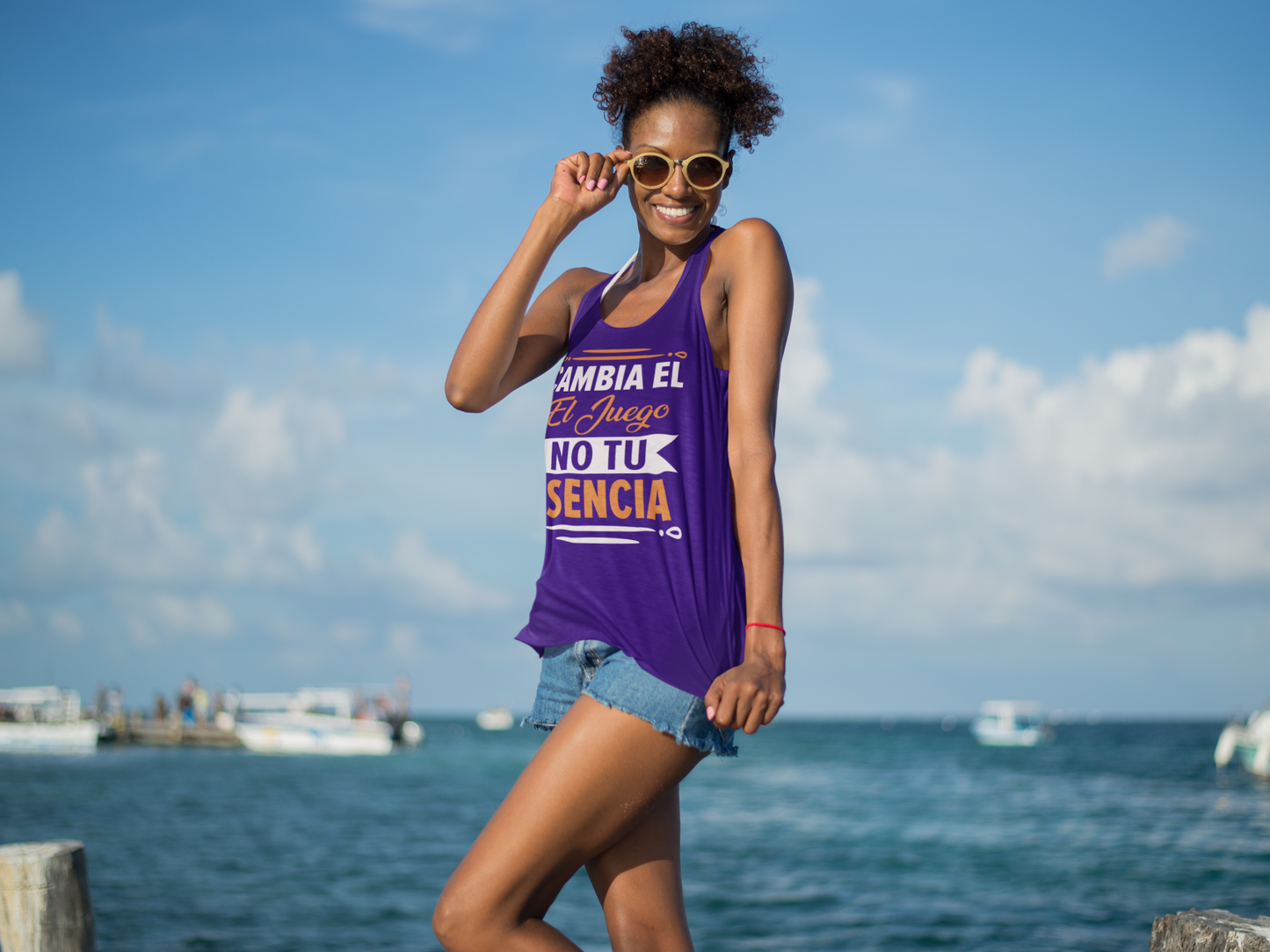 CAMBIA-EL-JUEGO,-NO-TU-ESENCIA Women's Racerback Tank